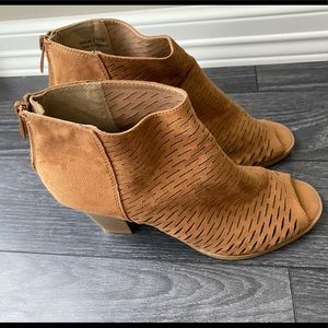 Tan colored open toed heeled boots